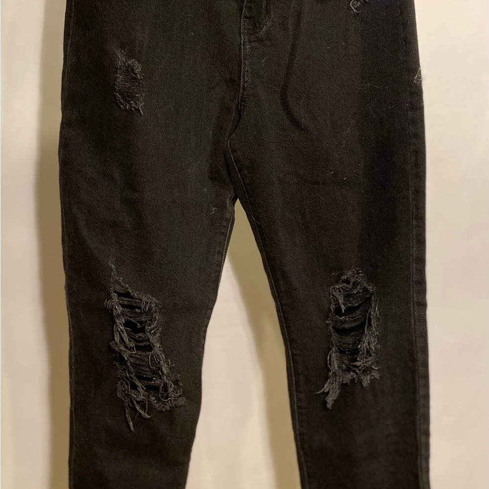 Sol Black Skinny Jeans with Modern Distressed Detailing